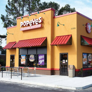 Street-side view of a thriving Popeyes Louisiana Kitchen in Sacramento, embodying the successful collaboration between the franchise and the strategic guidance in commercial real estate by Capital Rivers Commercial