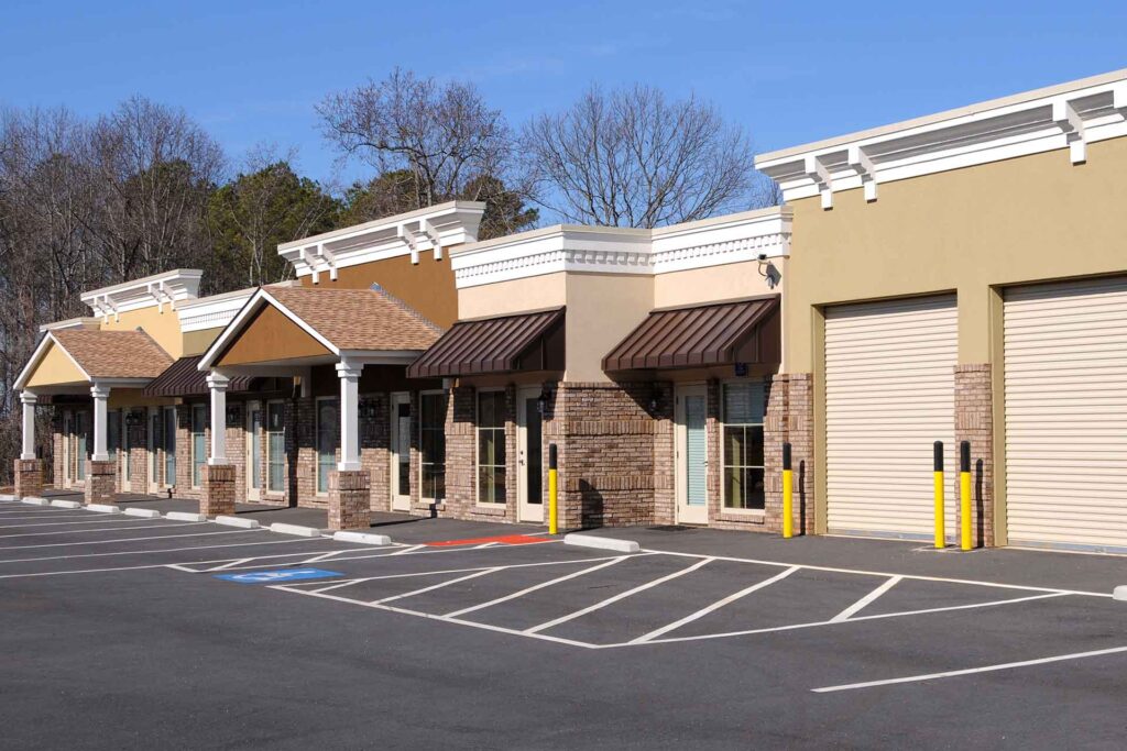 A vibrant retail center thriving through strategic enhancements, as advised by Capital Rivers Commercial, showcasing methods like tenant diversification, aesthetic upgrades, operational improvements, and proactive marketing to increase a property’s commercial value and appeal