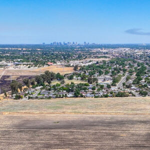 Image of Sacramento CA Development Land at Delta Shores with the city's skyline in the background.