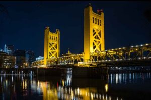 is Sacramento's commercial real estate market a good investment right now? This article explores key drivers and provides a sector-by-sector analysis, including the growing life-science and biotech sectors, to help you make an informed decision. Here's an image of Sacramento at night.