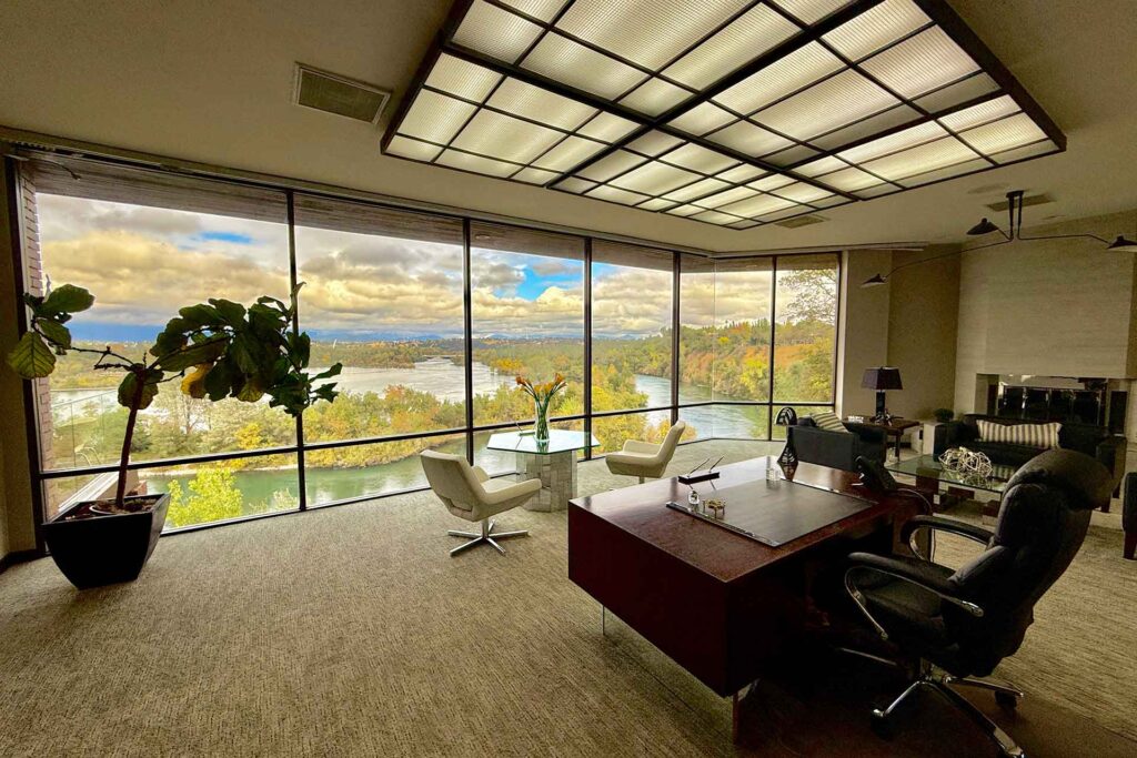 Image of high-end Redding office property with an amazing view of the river showing that the demand for office spaces in Redding is strong, with low vacancy rates showing that companies are actively seeking places to set up.