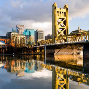 Sacramento's population continues to grow including a major league baseball team in West Sacramento, just over the bridge pictured here.