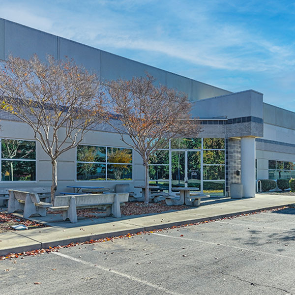 Side view of 2870 Kilgore Road in Rancho Cordova, showcasing the building’s modern design and biotech infrastructure within the growing Sacramento Life Science real estate market.
