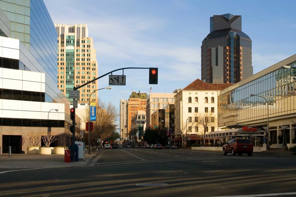 Image of Sacramento’s downtown showing its strategic location, economic stability, and affordable property prices.