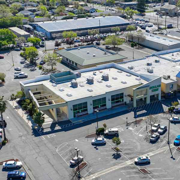 Side aerial image of a successful net lease Dollar Tree sale—even in uncertain conditions.