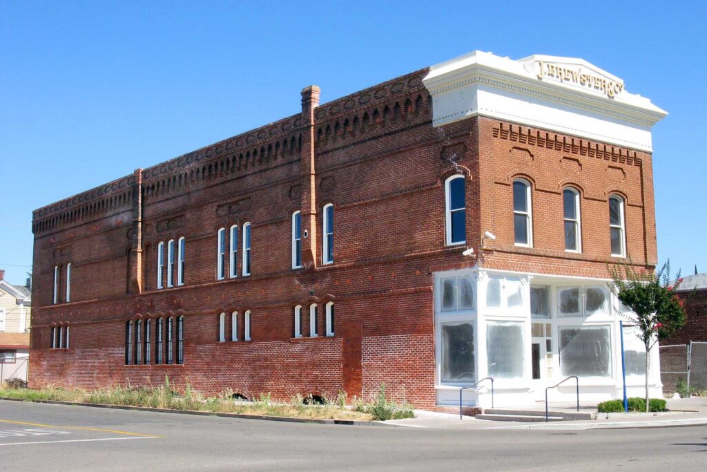 Historic Brewster Building (also known as Galt Mercantile or the Sawyer Building) under refurbishment in Galt, CA, symbolizing growing Galt commercial real estate activity.