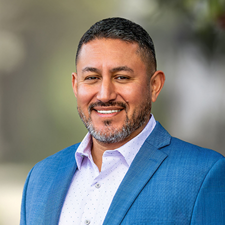 Juan Garcia, Director of Sales & Leasing at Capital Rivers Commercial, with expertise in the commercial real estate sector of Sacramento, CA. Pictured against a sleek office environment, Juan's confident and knowledgeable expression highlights his significant role in driving sales and leasing strategies for the vibrant commercial real estate market in Sacramento and the encompassing areas