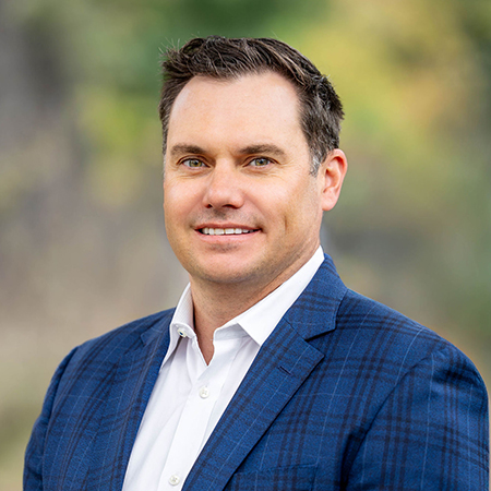 Greg Aguirre, CEO of Capital Rivers Commercial. He is pictured in a well-lit office setting in Sacramento.