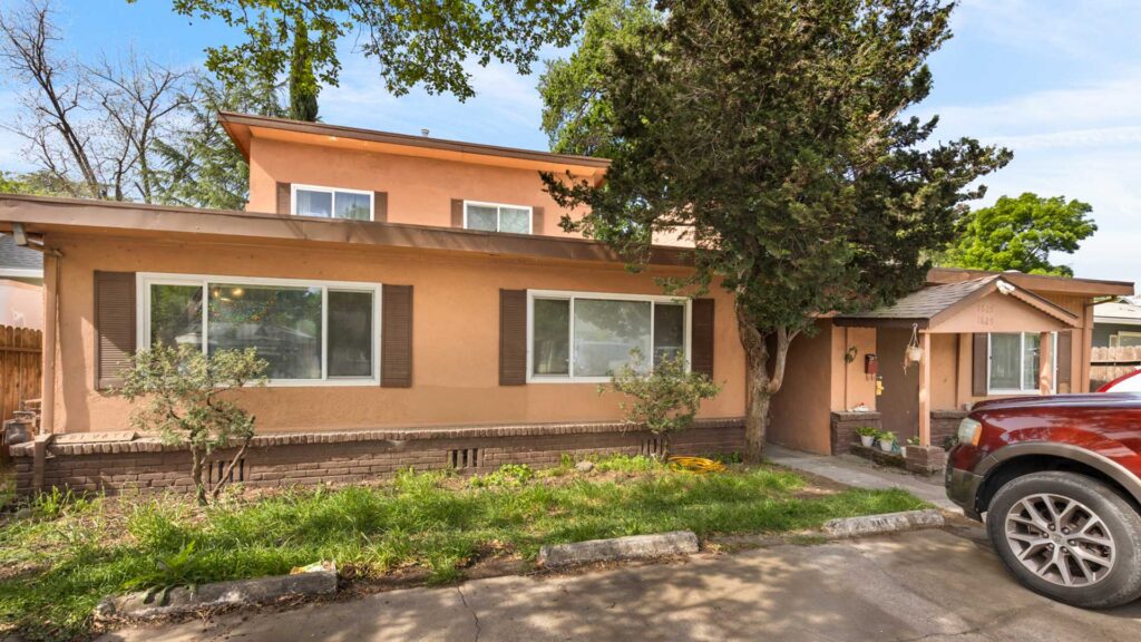 Exterior view of an apartment building in Chico, CA with limited new market-rate apartments under construction