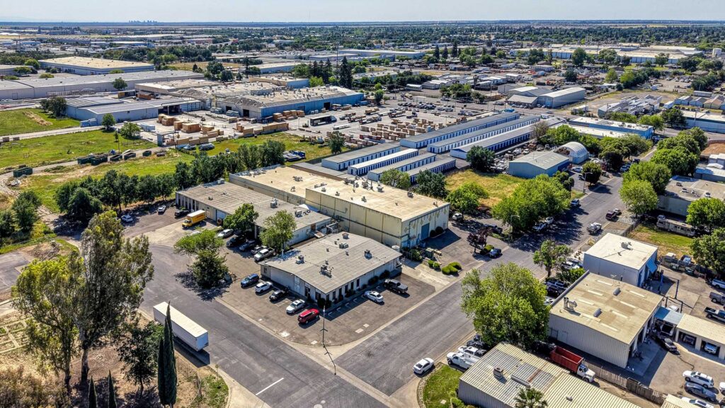 Aerial view of an industrial property and surrounding warehouses highlighting power capacity for industrial use.