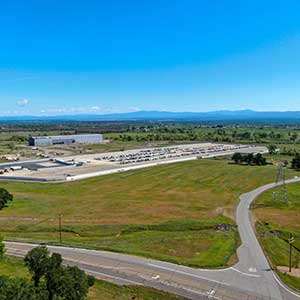 Aerial view of industrial land and development highlighting power capacity for industrial use.