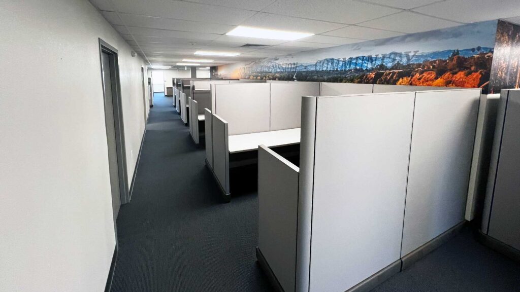 Government office space in Redding with private offices, cubicles and an open workspace layout.
