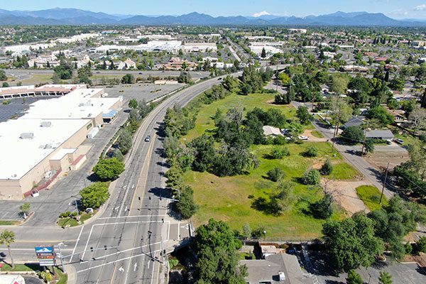 Aerial image of four level commercial parcels zoned general office along Churn Creek Road