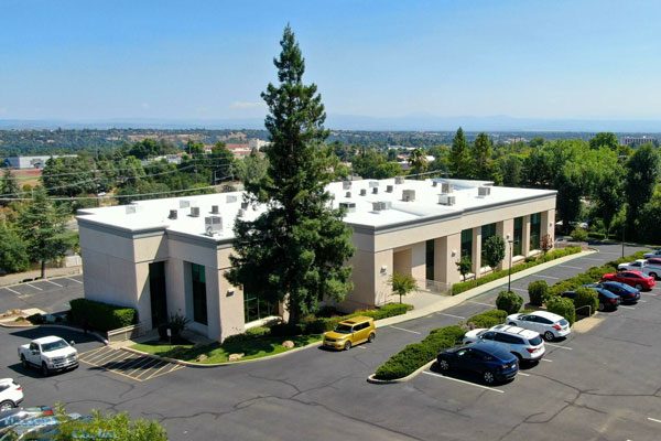 Image of a prominent professional office building in Redding, CA offering a variety of professional spaces ranging in size from 1,200 to 4,300 square feet.