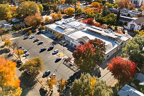 Aerial image of 5th & Flume is a fully developed city block offering ±34,258 square feet of commercial space across four well-maintained buildings on ±1.6 acres.